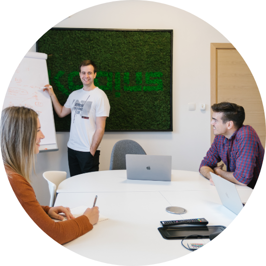 Step one image - Tin at whiteboard; explaining new stuff to colleagues